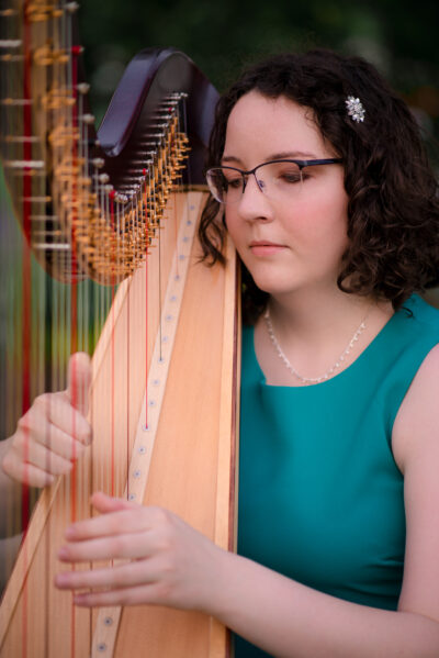 Heather Cornelius playing harp